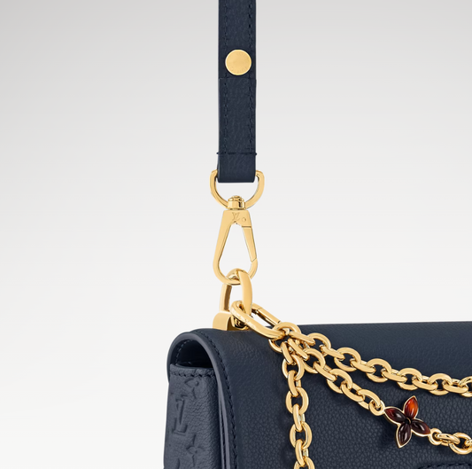 LV x TM Twist MM Slim Bag